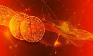 Dwie monety bitcoin w ogniu